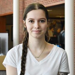 Tonya Kramer, posing for a photo in the university center commons